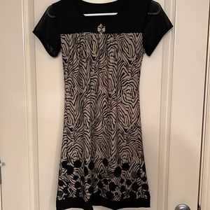 Cute mini dress with sheer cap sleeves
